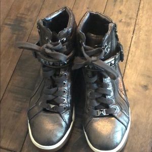 Michael Kor’s glam studded high top sneakers